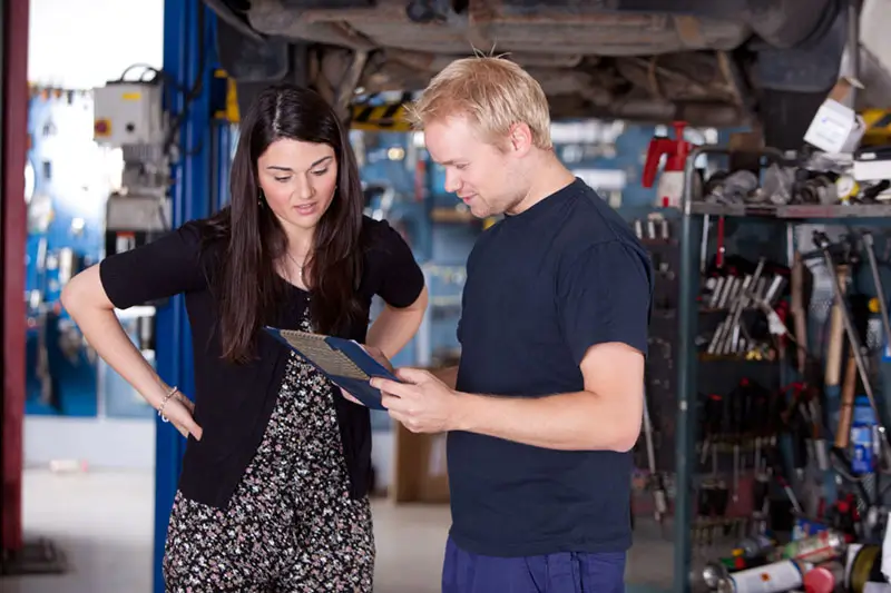 Happy Customer at Mechanic Shop Happy Customer at Mechanic Shop