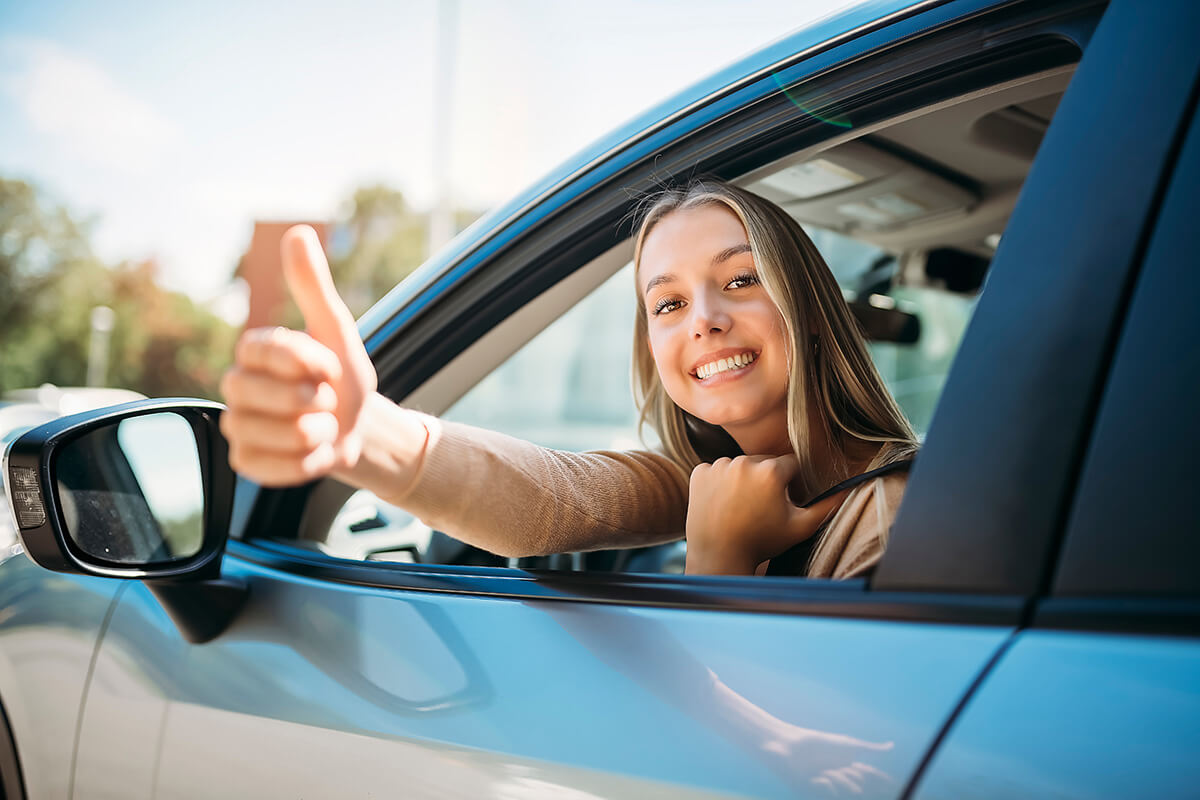 happy owner of a new car