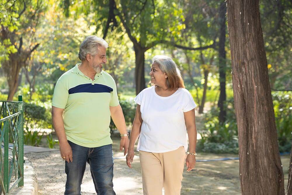 senior couple giving happy expression and spending time together at park